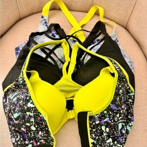 Victoria's Secret Neon Yellow and blueand multi color zip Sports Bra set of 2